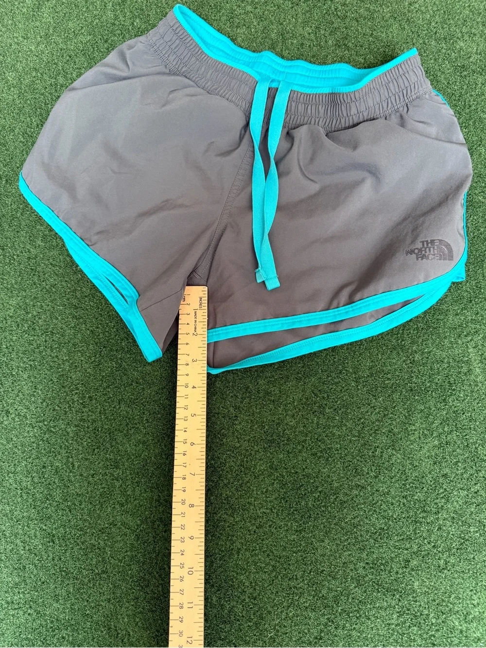 The North Face Women’s Gray Athletic Shorts with Teal Trim